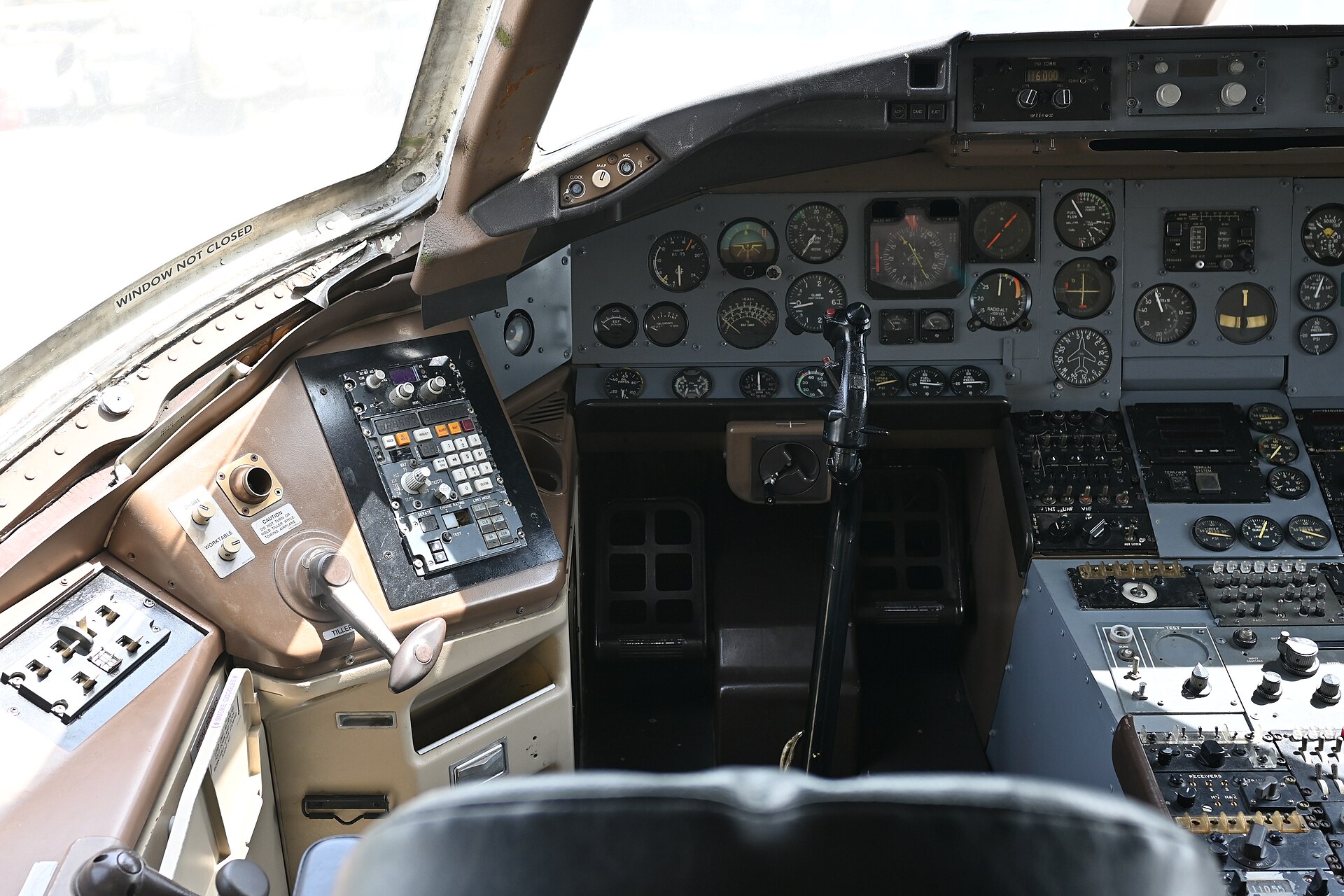 The instrument panel of a vintage commercial airliner cockpit